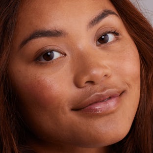 Evening skin tone Woman with clear skin tone reflecting even pigmentation after a chemical peel